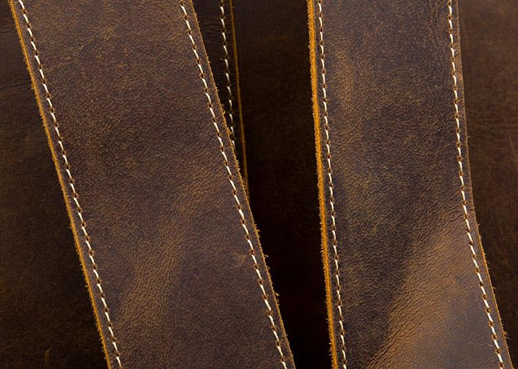 The Langley Genuine Leather Backpack in vintage crazy horse leather, featuring multiple pockets and ergonomic straps for everyday use