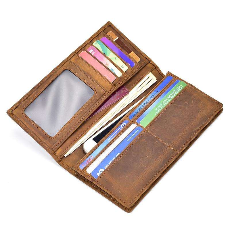 The Pathfinder Bifold Wallet made of genuine Crazy Horse leather with multiple card slots, clear ID window, zippered coin pocket, and slim design.