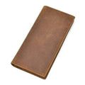 The Pathfinder bifold wallet made of genuine Crazy Horse leather with multiple card slots, ID window, zippered coin pocket, and slim design