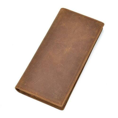The Pathfinder bifold wallet made of genuine Crazy Horse leather with multiple card slots, ID window, zippered coin pocket, and slim design