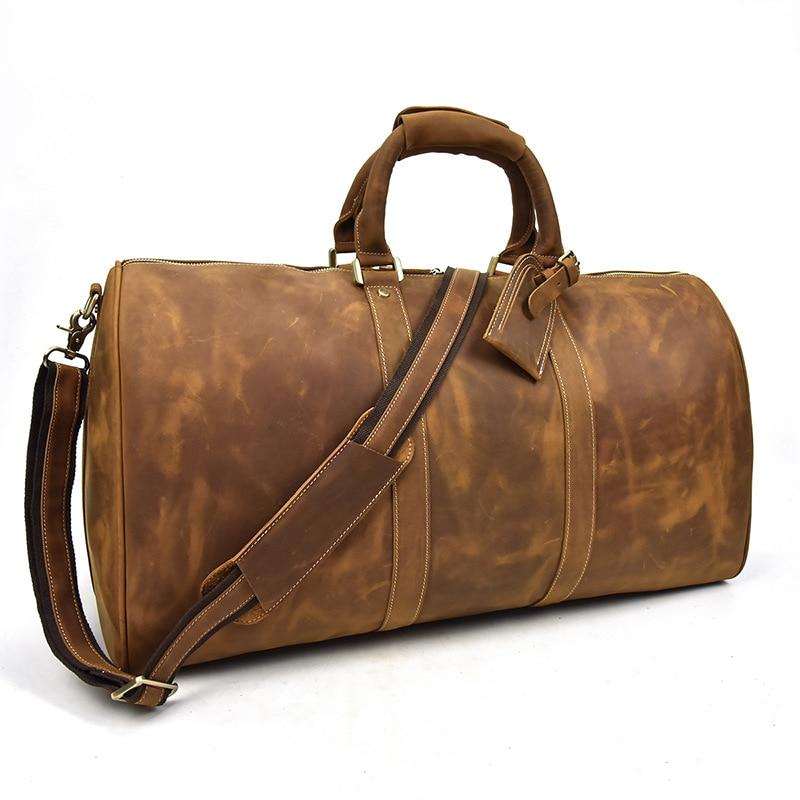 Bjarke Weekender handcrafted leather duffle bag with rugged vintage design and removable shoulder strap