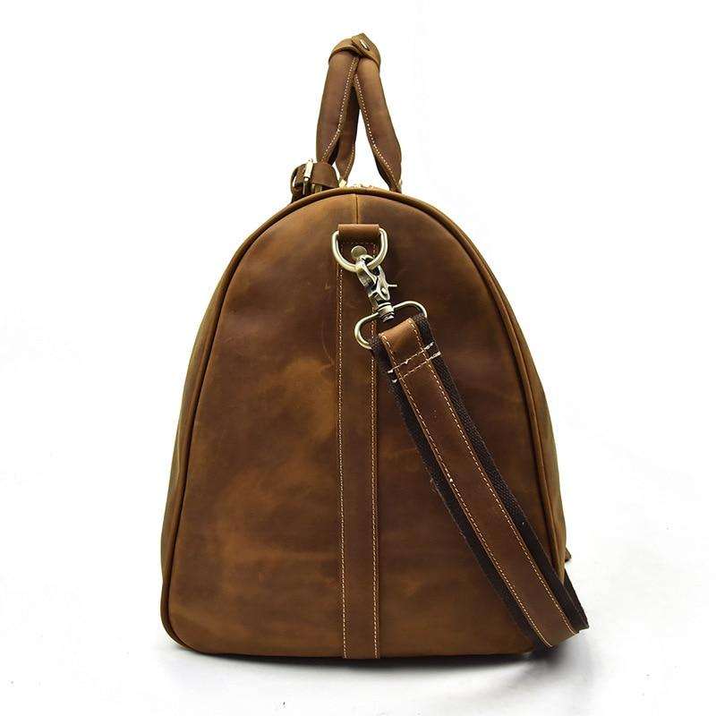 Bjarke Weekender handcrafted leather duffle bag in vintage crazy horse leather with removable shoulder strap and multiple compartments