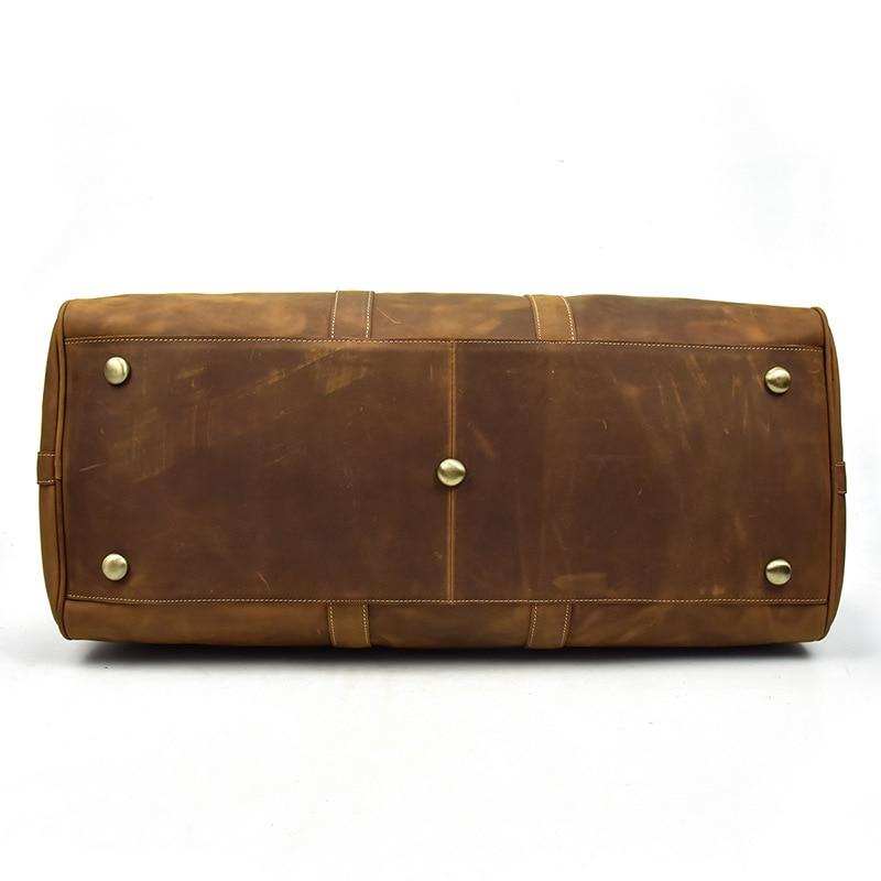 Bjarke Weekender handcrafted leather duffle bag in vintage crazy horse leather with overlay design and adjustable shoulder strap