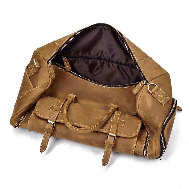 Handmade leather duffle bag in rich brown crazy horse leather with spacious compartments and removable shoulder strap