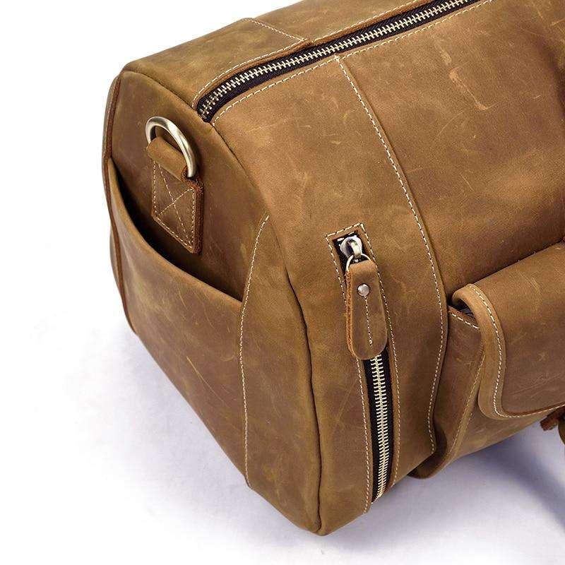 Handmade leather duffle bag in rich brown crazy horse leather with spacious compartments and removable shoulder strap