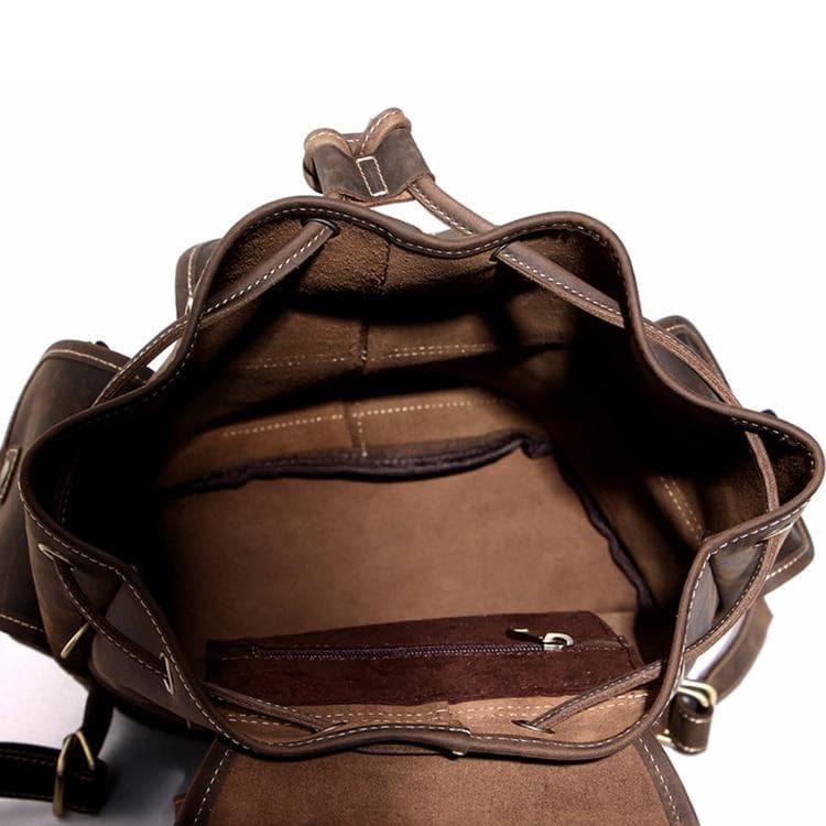 The Asmund Backpack genuine leather rucksack in vintage brown with buckled pockets and adjustable straps