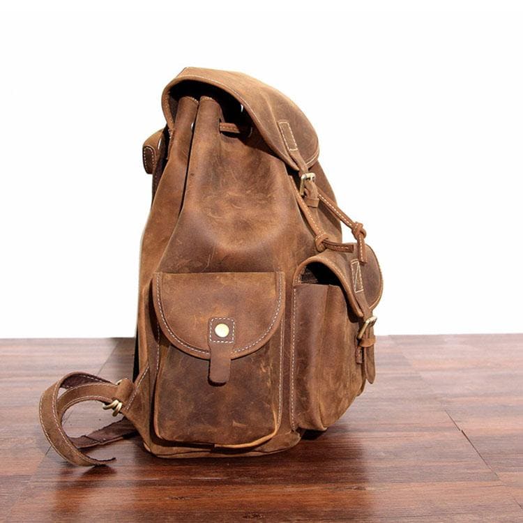 The Asmund Backpack genuine leather rucksack in distressed vintage style with multiple pockets and adjustable straps