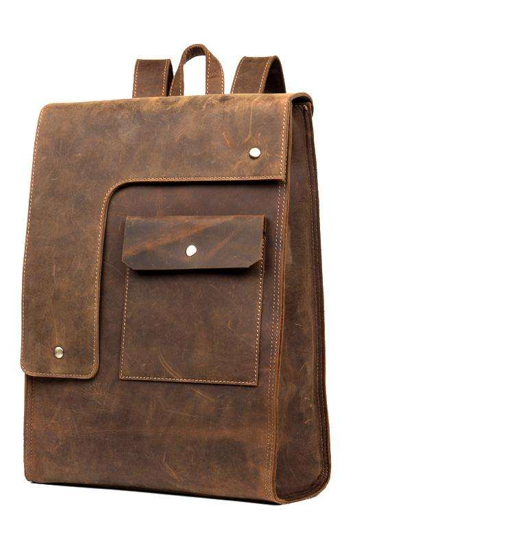 Vintage Leather Backpack in distressed brown leather with a flap closure and front pocket with snap fastening