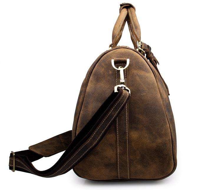 The Brandt Weekender small black leather duffle bag with adjustable strap and leather handle