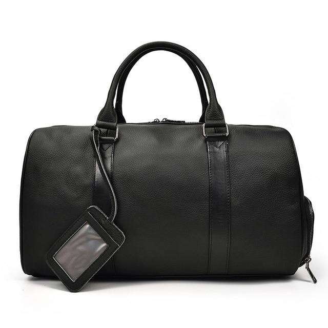 Endre Weekender Leather Duffle Bag in black leather with adjustable shoulder strap and spacious compartments