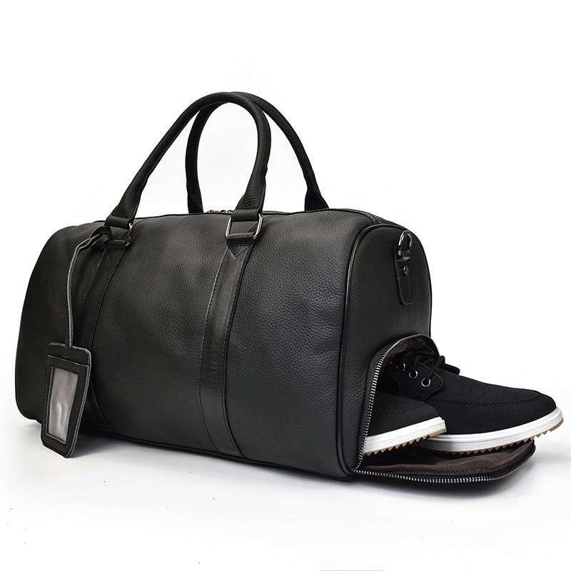 Endre Weekender Leather Duffle Bag in black premium leather with adjustable shoulder strap and multiple compartments for travel and work
