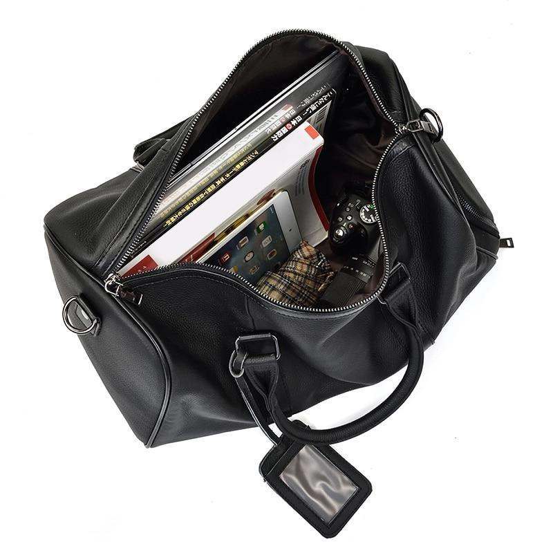 Endre Weekender Leather Duffle Bag in black premium leather with adjustable shoulder strap and multiple compartments for travel and daily use