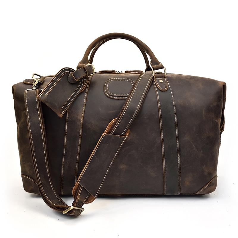 Vintage leather duffle bag made from premium crazy horse leather with spacious compartments and adjustable shoulder strap