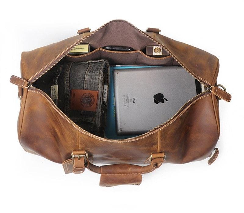 Dagny Leather Weekender Duffle Bag made from premium crazy horse leather with multiple compartments and removable shoulder strap