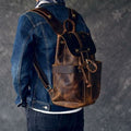 The Olaf Leather Travel Backpack vintage brown leather rucksack with dual front pockets and adjustable straps