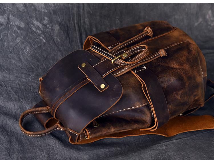 Olaf Leather Travel Backpack in vintage crazy horse leather with front pockets and adjustable straps
