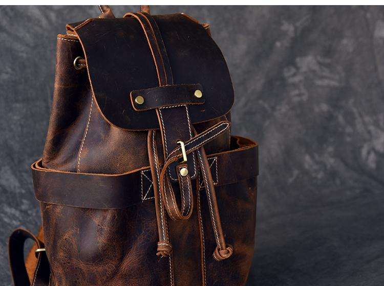 Olaf Leather Travel Backpack in vintage crazy horse leather with front pockets and adjustable straps