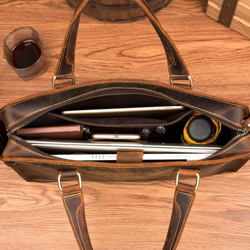 Viggo Genuine Leather Messenger Bag in brown crazy horse leather with adjustable strap and multiple compartments for professionals